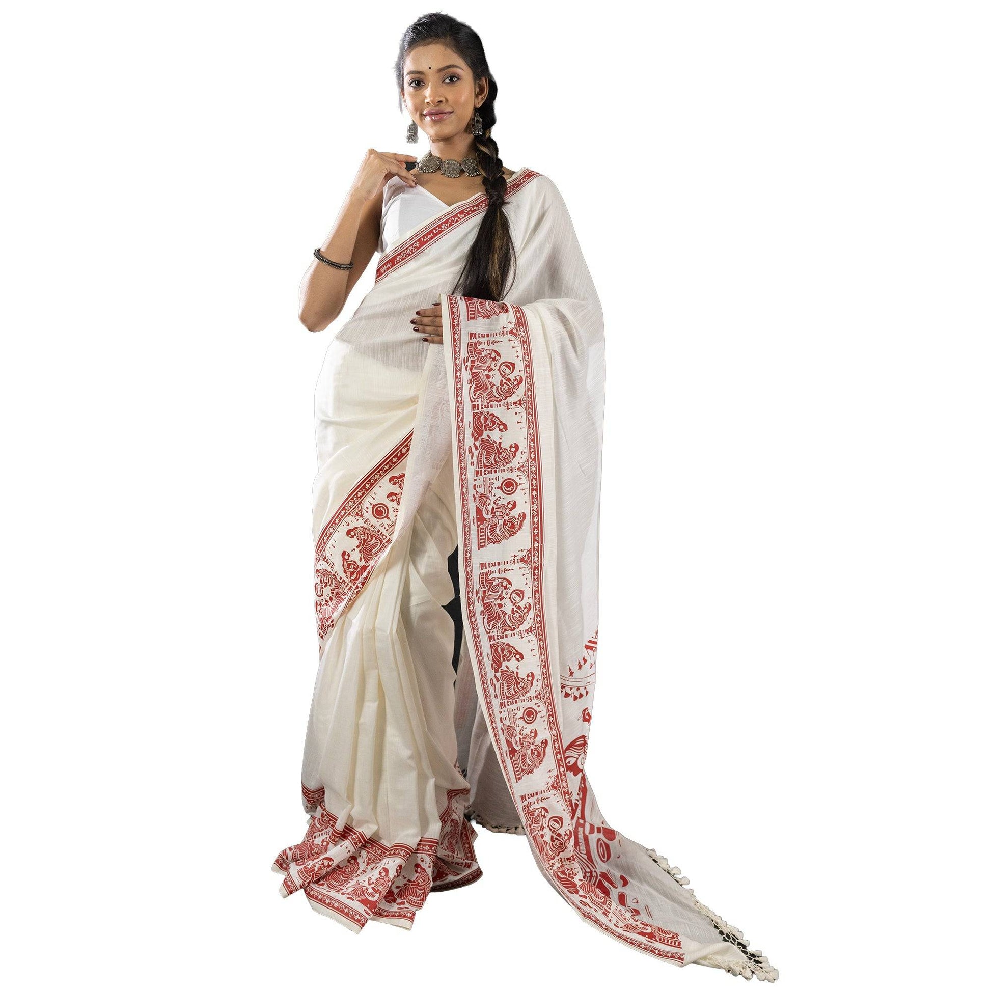 Front view of Sringer red on white khadi cotton saree with traditional Patachitra prints, ideal for cultural occasions.