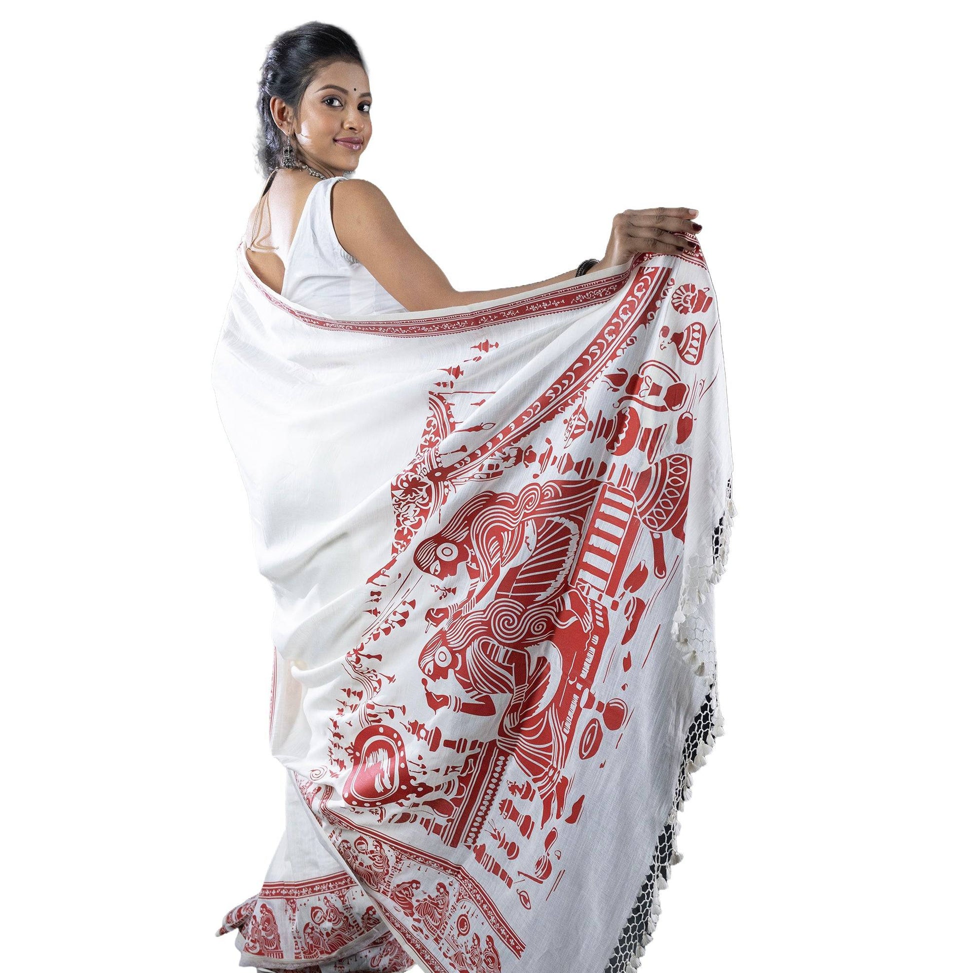 Back view of Sringer printed khadi cotton saree highlighting bold Kalighat Patachitra art in red on white.