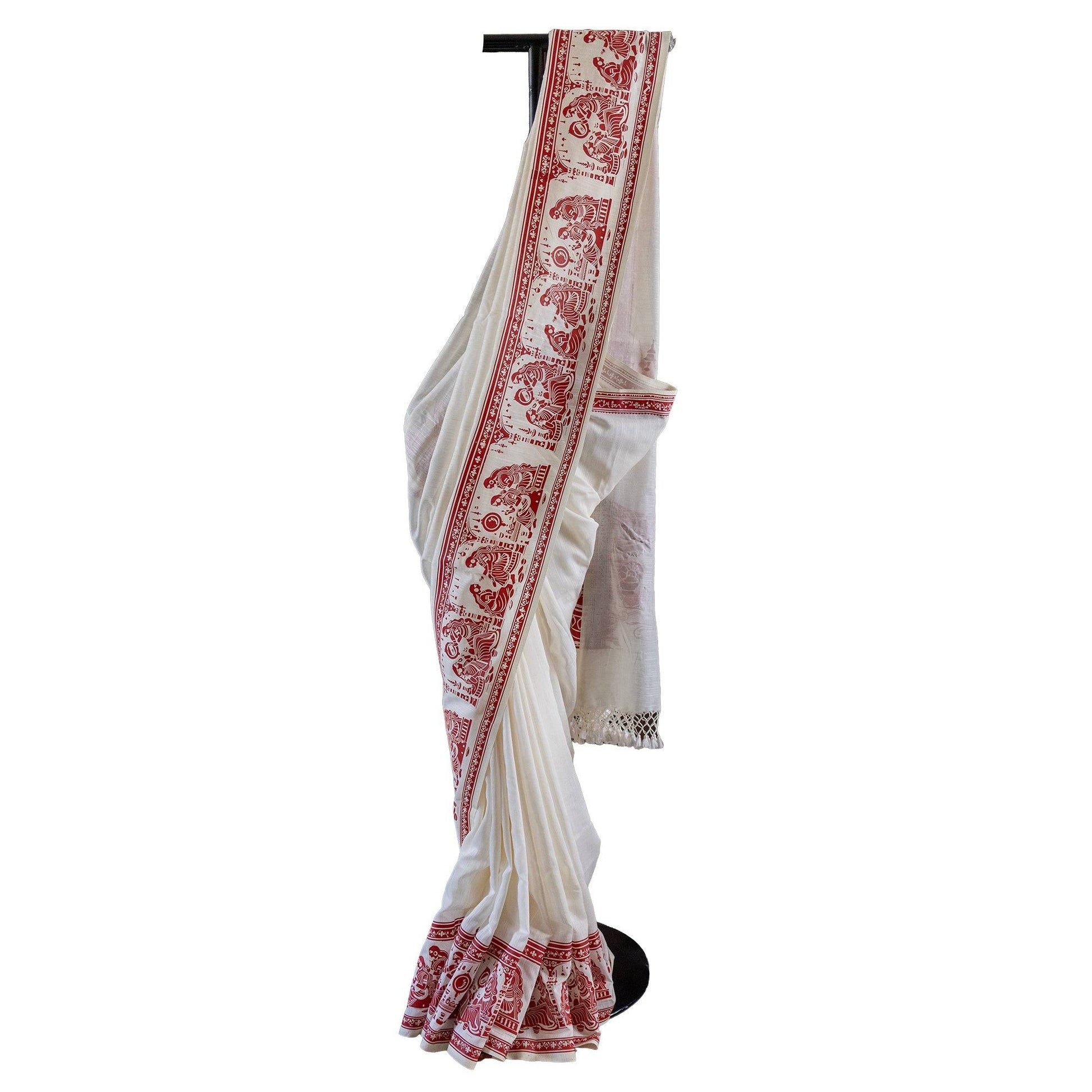 Sringer red on white printed saree in khadi cotton with Kalighat Patachitra motifs, ideal for traditional wear and cultural occasions.