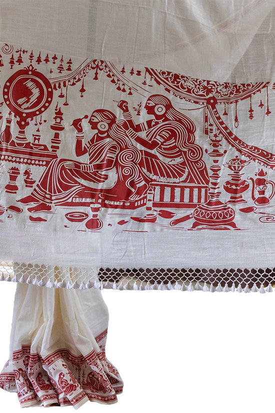 Sringer red on white printed khadi cotton saree featuring Kalighat Patachitra style art with intricate traditional motifs and border design.