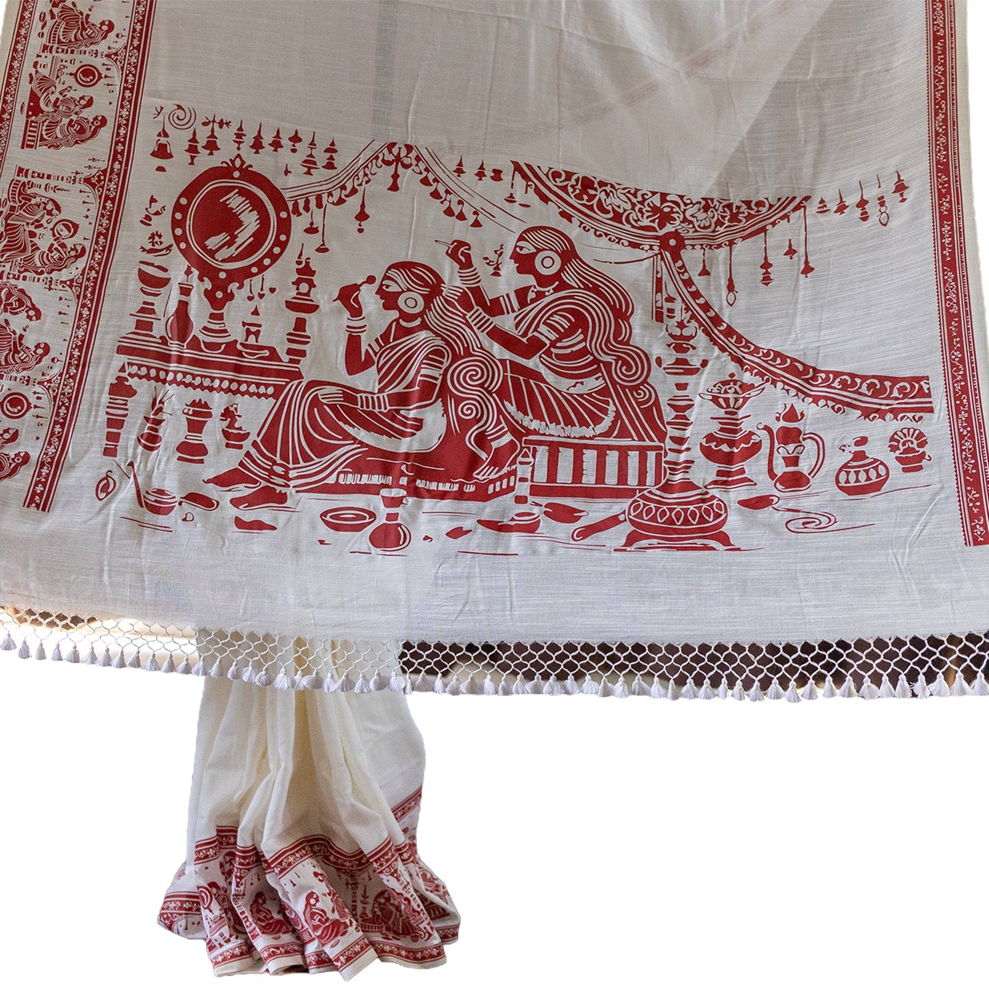 Sringer red on white printed khadi cotton saree featuring Kalighat Patachitra style art with intricate traditional motifs and border design.