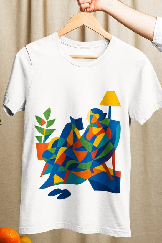 The Reader Tee - Abstract Graphic Tee in soft cotton featuring a colorful cubist design of a person reading. Ideal unisex shirt for art lovers.
