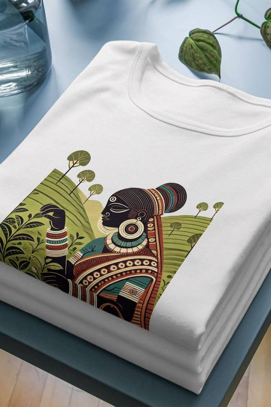 Patachitra T-Shirt for women featuring a tribal plucker graphic inspired by Bengali art. Made from soft cotton for breathable comfort and cultural elegance.