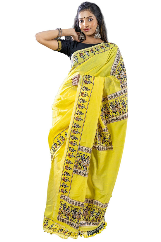 Limited edition yellow cotton saree with tribal dance graphics and detailed border prints. Traditional attire in breathable khadi fabric.