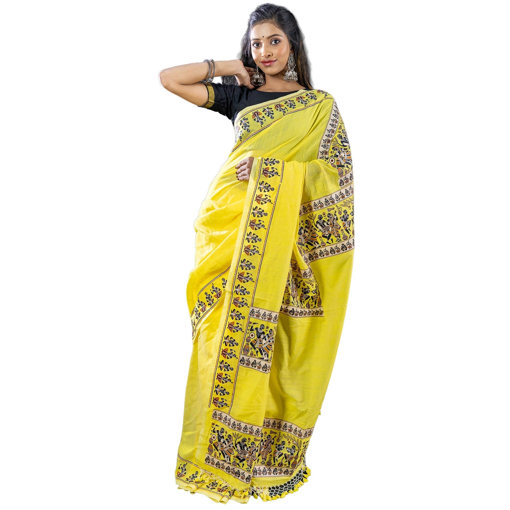 Limited edition yellow cotton saree with tribal dance graphics and detailed border prints. Traditional attire in breathable khadi fabric.