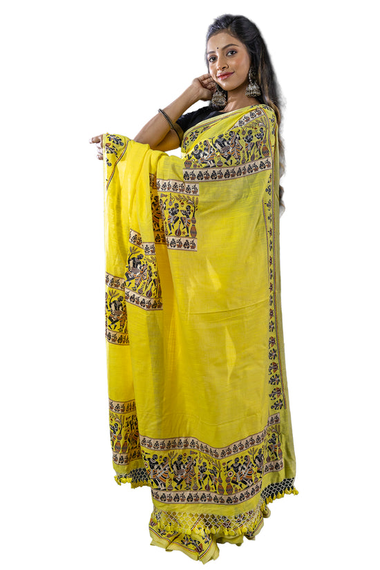 Pure khadi cotton saree in vibrant yellow with tribal dance motifs and decorative borders. A cultural statement piece for ethnic wardrobes.