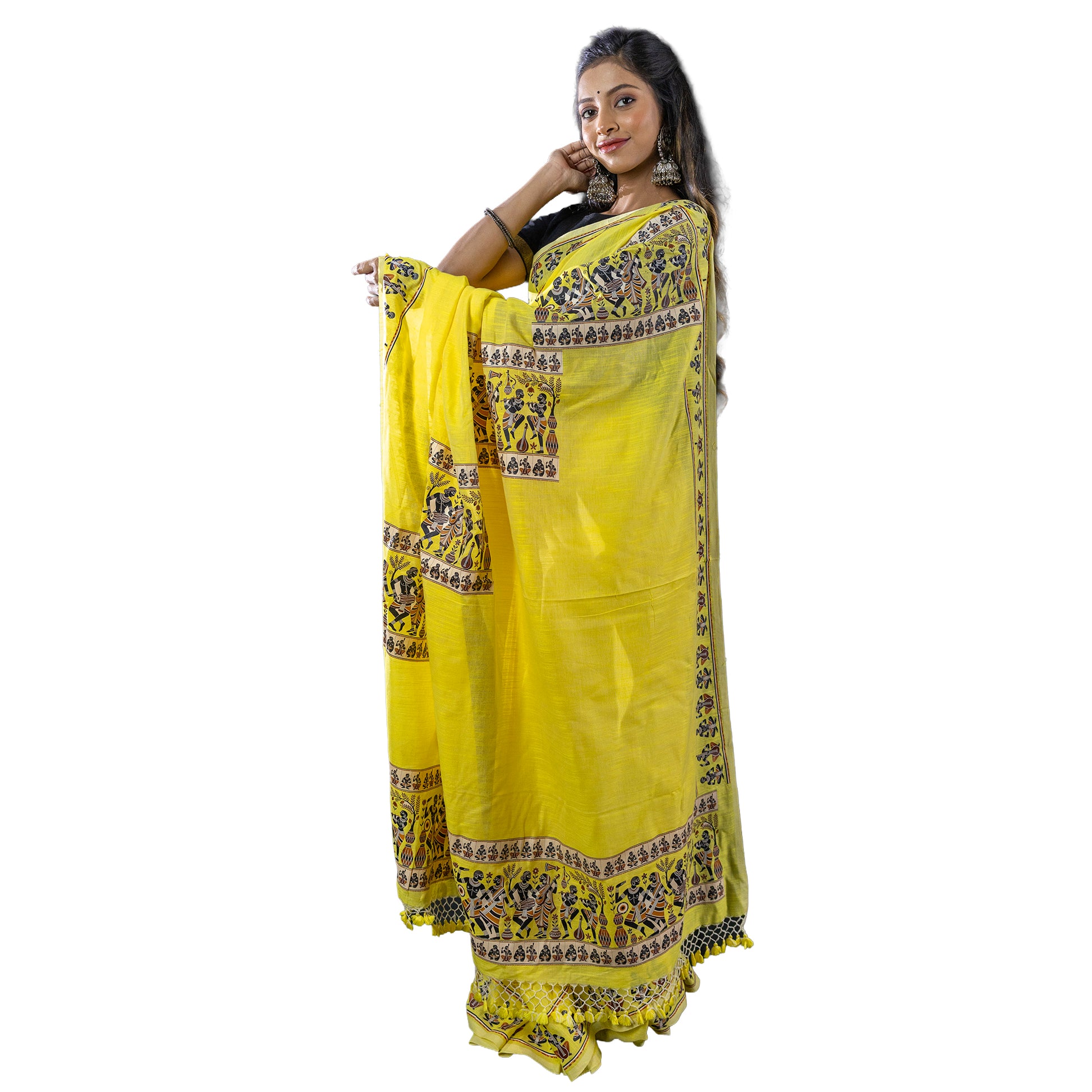 Pure khadi cotton saree in vibrant yellow with tribal dance motifs and decorative borders. A cultural statement piece for ethnic wardrobes.