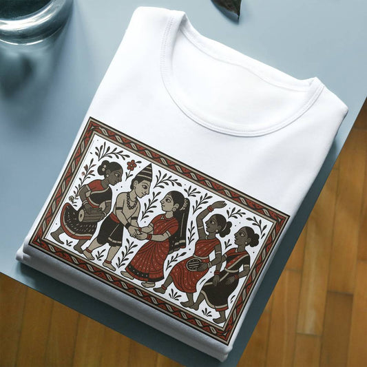 Tribal Wedding T-Shirt featuring Bengali Patachitra art style, folded neatly on a table; premium cotton fabric with vivid traditional graphic print.