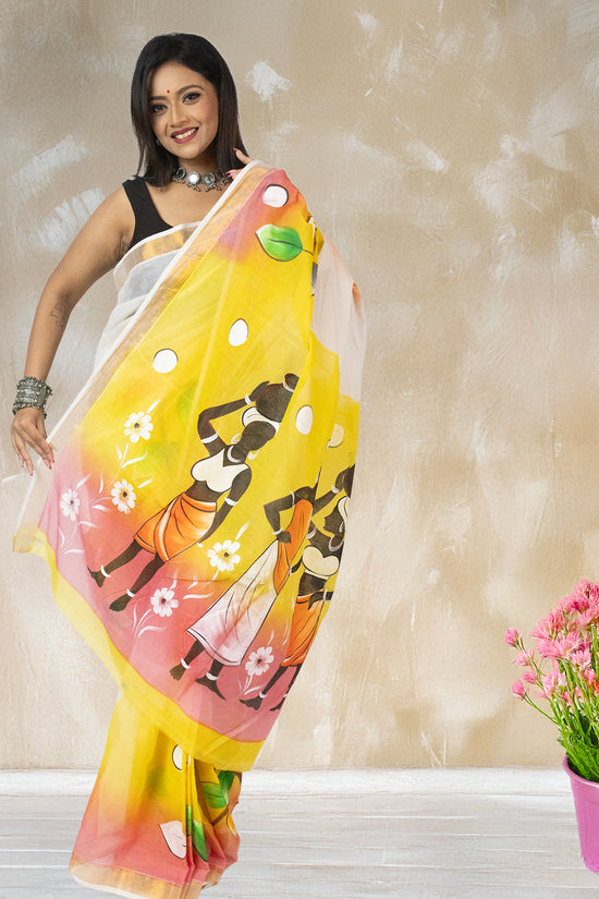 Kerala cotton hand-painted saree from Tribal Tales collection with colorful tribal motifs and floral accents, perfect for traditional wear.