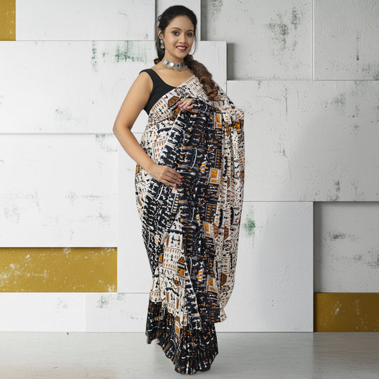 Warli Tales Saree - Tribal Art Cotton with detailed heritage prints in black and ochre, styled for traditional and casual occasions.
