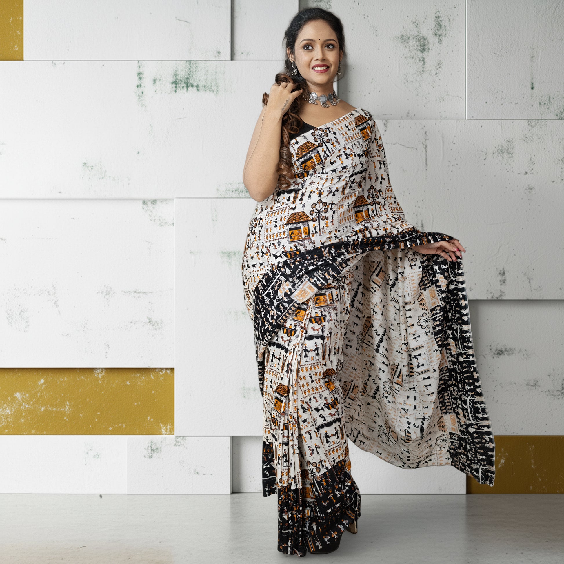 Warli Tales Saree - Tribal Art Cotton featuring Warli folk art patterns, perfect for cultural celebrations and ethnic fashion lovers.