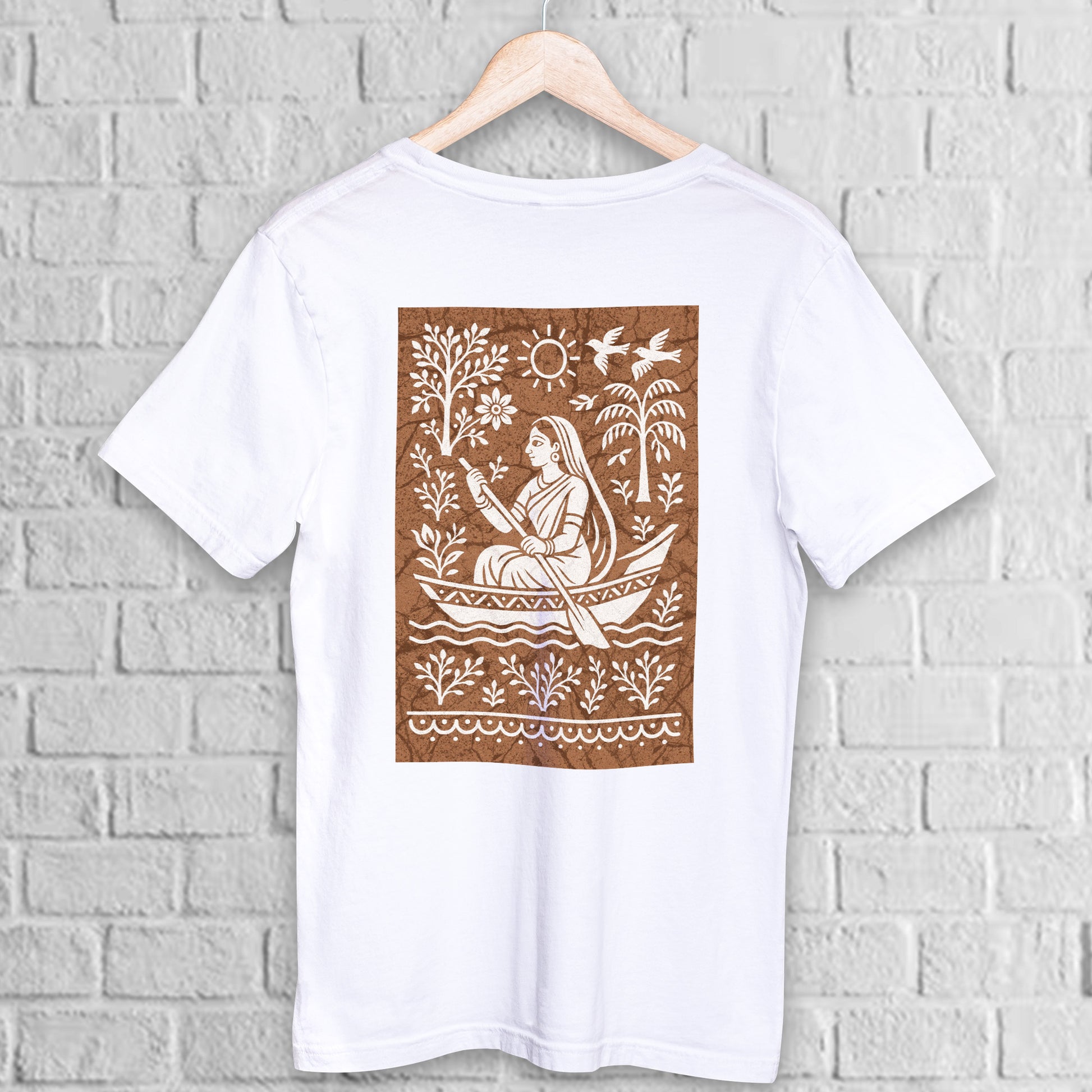 Bengali Boatwoman T-Shirt in batik folk art style printed on white premium cotton. Features a traditional boatwoman design with nature motifs.