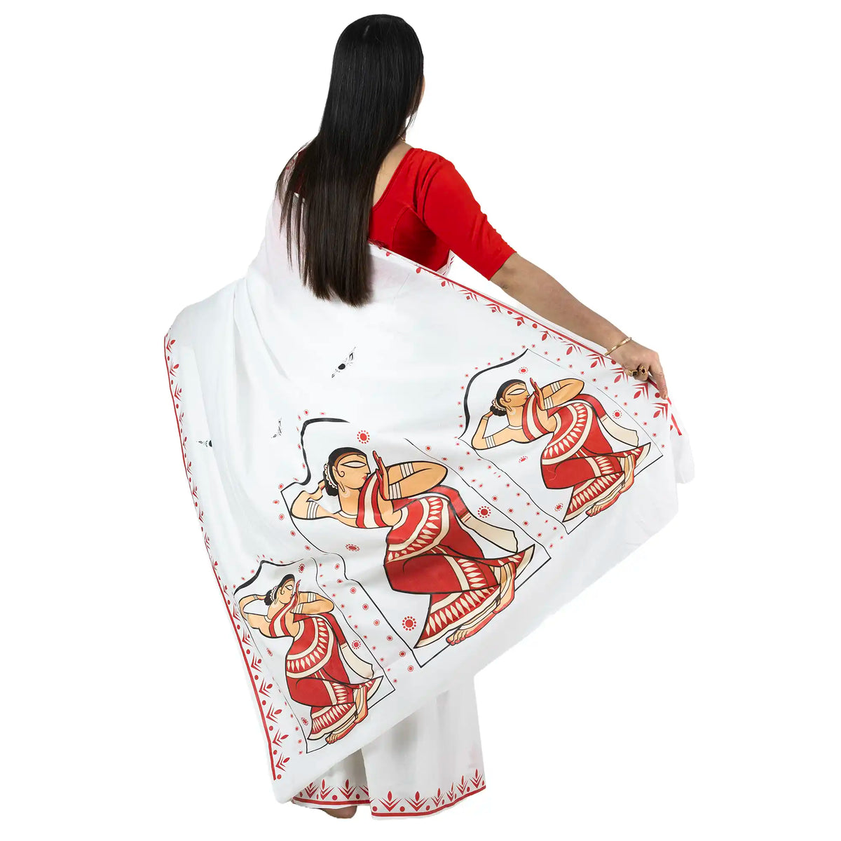 Front angled view of Bharatanatyam dancer saree with red leaf-and-arrow border on white khadi cotton
