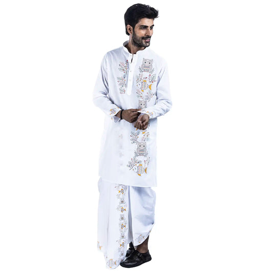 Man wearing white cotton panjabi with Kantha-style owl and fish motif panel and matching dhuti, side view