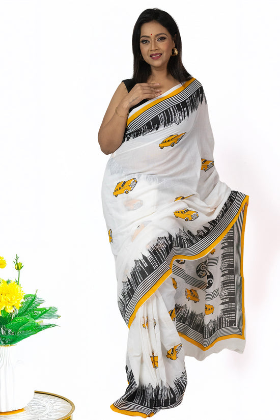 Kolkata Theme Cotton Saree in white with yellow taxi motifs and black skyline border, ideal for festive wear and Bengali cultural celebrations.