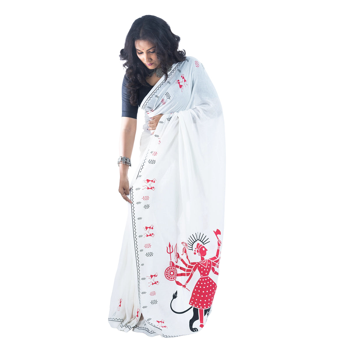 Draped white cotton saree with Warli folk art print of Durga slaying Mahishasura, festive look